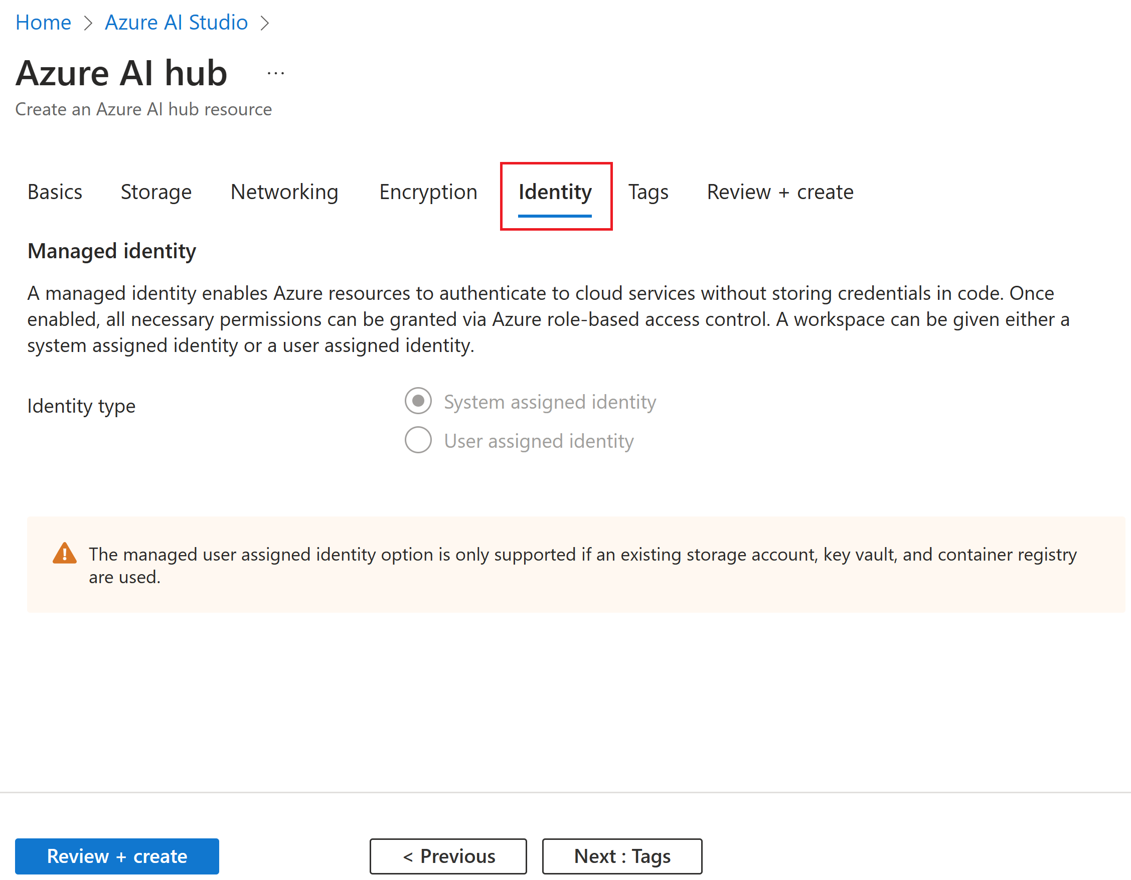 “创建 Azure AI 中心资源”的屏幕截图,其中包含用于选择托管标识的选项。